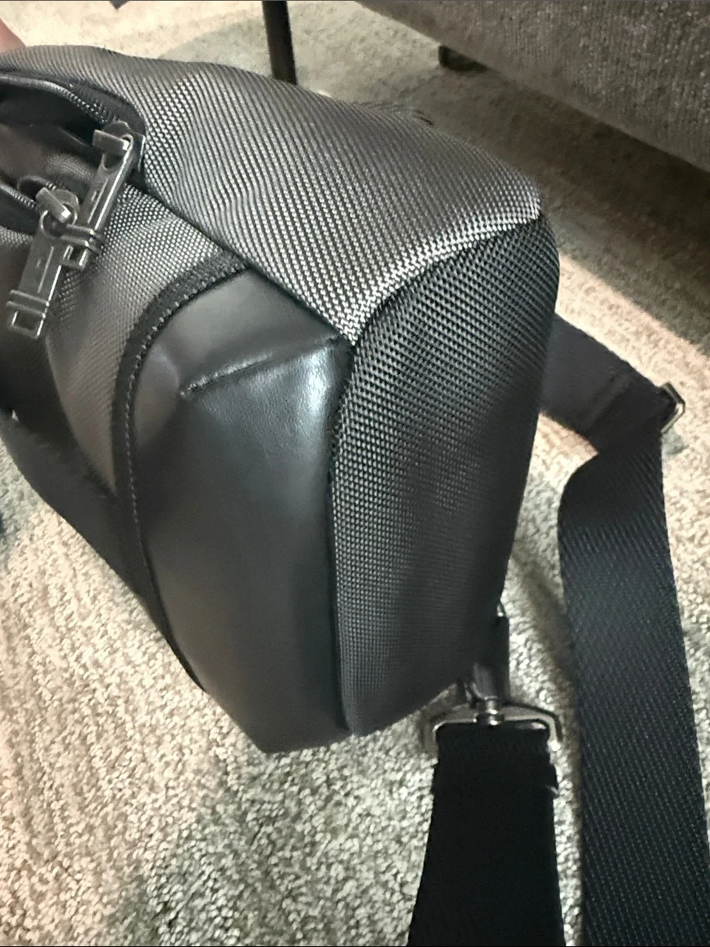 Tumi Gray Sling Bag with Red Accent- NEVER USED OR WORN. Tags removed, A gift